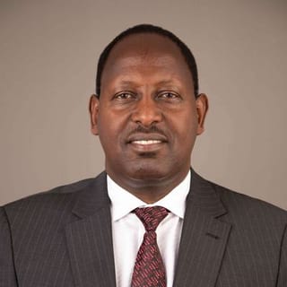 Dr. John Kanyuithia Mutunga